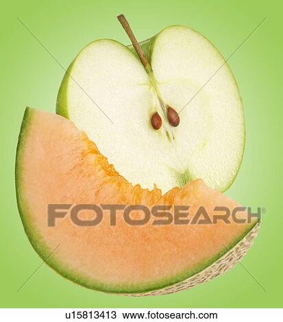 Stock Image - Apple And Melon On Green. Fotosearch