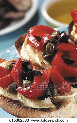 Stock Image - Baked vegetables on goats cheese. Fotosearch