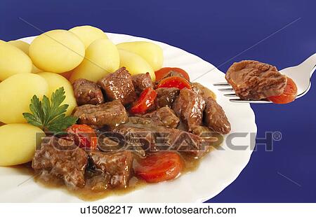 Stock Photo - Beef Stew With Fork - Non Exclusive. Fotosearch