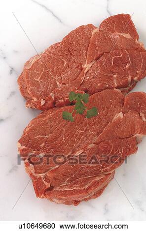 Braising steak with parsley View Large Photo Image Stock Image - Braising steak with parsley. Fotosearch