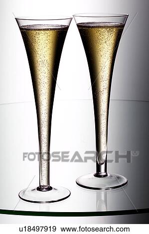 Champagne flutes View Large Photo Image Stock Photo - Champagne flutes. Fotosearch