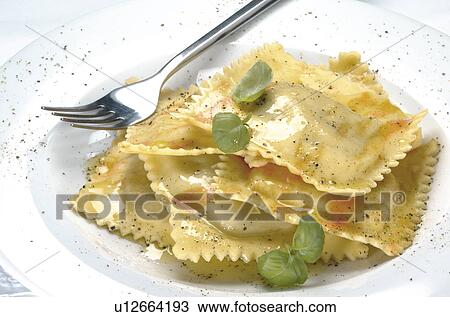 Cheese and tomato ravioli View Large Photo Image Stock Image - Cheese and tomato ravioli. Fotosearch