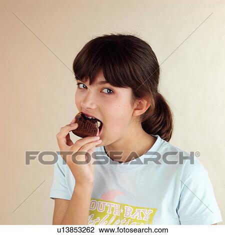 Stock Image - Child eating. Fotosearch