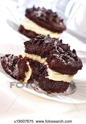 Chocolate and cream muffin View Large Photo Image Stock Photography - Chocolate and cream muffin. Fotosearch