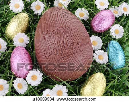 Chocolate Easter Eggs on Grass - Non Exclusive View Large Photo Image Picture - Chocolate Easter Eggs on Grass - Non Exclusive. Fotosearch
