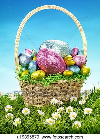 Stock Photo - Chocolate Eggs in Basket - Non Exclusive. Fotosearch