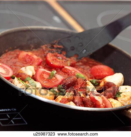 Stock Image - Chorizo and chicken. Fotosearch