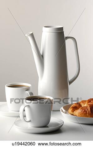 Stock Image - Coffee and croisants. Fotosearch