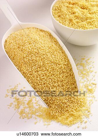 Couscous in Scoop - Non Exclusive View Large Photo Image Stock Image - Couscous in Scoop - Non Exclusive. Fotosearch