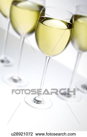Glasses of white wine View Large Photo Image Stock Image - Glasses of white wine. Fotosearch
