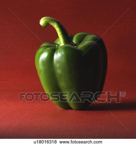 Stock Photo - green pepper on brown. Fotosearch