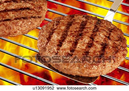 Stock Image - Hamburgers barbecue. Fotosearch
