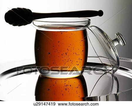 Honey Jar And Dipper - Non Exclusive View Large Photo Image Stock Photo - Honey Jar And Dipper - Non Exclusive. Fotosearch