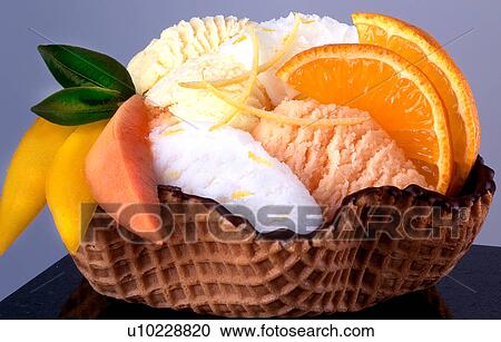 Stock Image - Ice cream with fruit. Fotosearch