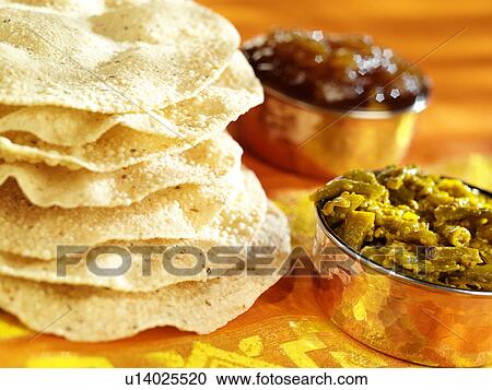 Stock Image - Indian Papadams And Chutney - Non Exclusive. Fotosearch