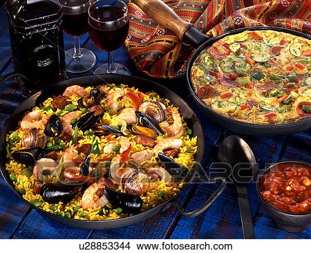 Paella and Spanish omlette View Large Photo Image Picture - Paella and Spanish omlette. Fotosearch