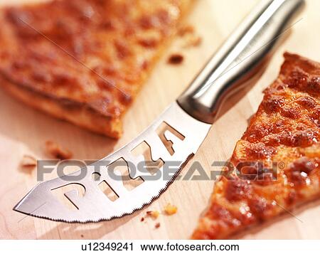 Stock Image - Pizza Knife - Non Exclusive. Fotosearch