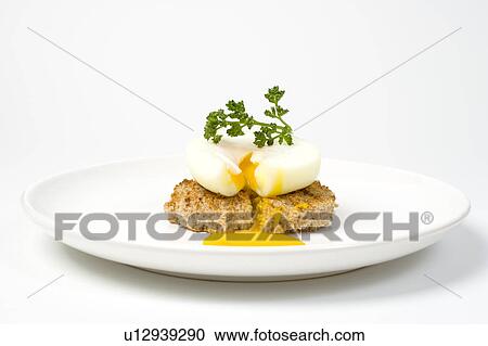 Poached eggs on brown toast, View Large Photo Image Stock Image - Poached eggs on brown toast, . Fotosearch