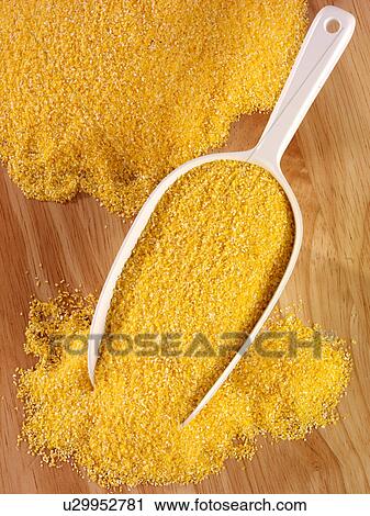 Stock Image - Polenta in Scoop - Non Exclusive. Fotosearch