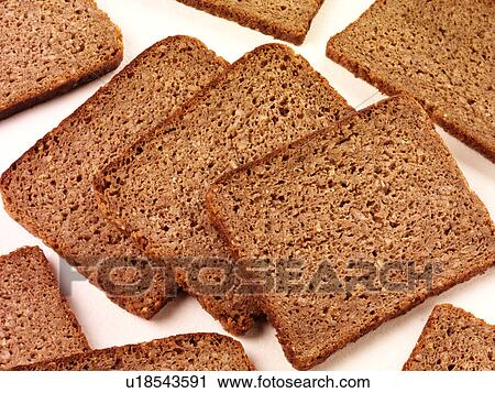 Stock Image - Pumpernickel Bread - Non Exclusive. Fotosearch