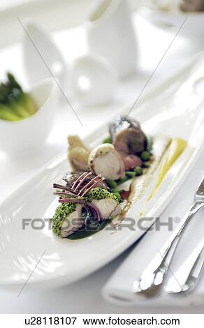 Stock Photo - Rabbit, a herb crust. Fotosearch
