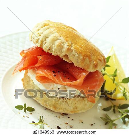 Stock Image - Salmon and cream cheese scone. Fotosearch