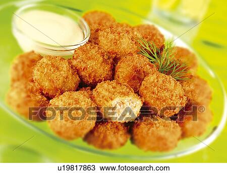 Stock Image - Salmon fishcakes. Fotosearch