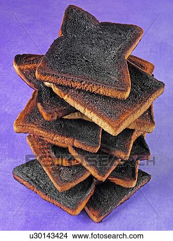 Picture - Stack of Burnt Toast - Non Exclusive. Fotosearch