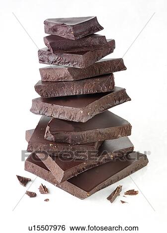 Stock Photograph - Stack of Dark Chocolate Chunks - Non Exclusive. Fotosearch