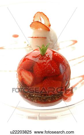 Stock Photography - Strawberry dessert with ice cream. Fotosearch