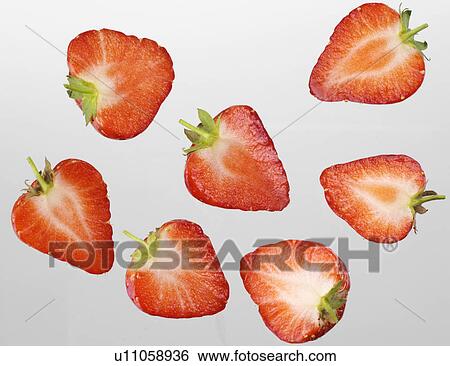 Stock Photograph - Strawberry Halves - Non Exclusive. Fotosearch