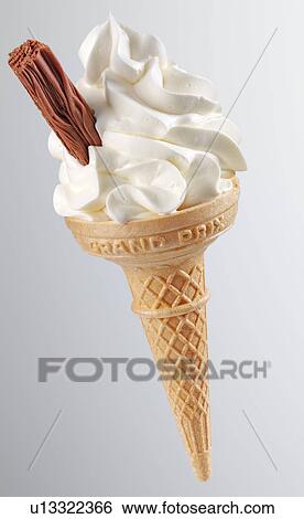 Vanilla Ice Cream Cone With Flake on Grey - Non Exclusive View Large Photo Image Stock Photograph - Vanilla Ice Cream Cone With Flake on Grey - Non Exclusive. Fotosearch