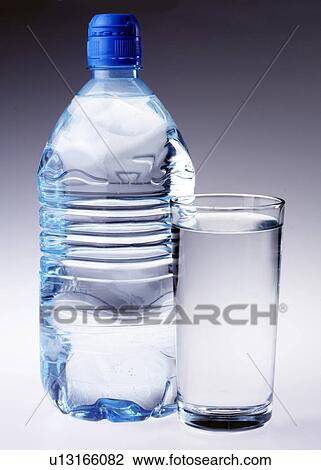 Stock Image - Water Bottle And Glass - Non Exclusive. Fotosearch