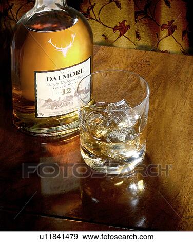 Stock Photo - Whisky Bottle and Glass. Fotosearch