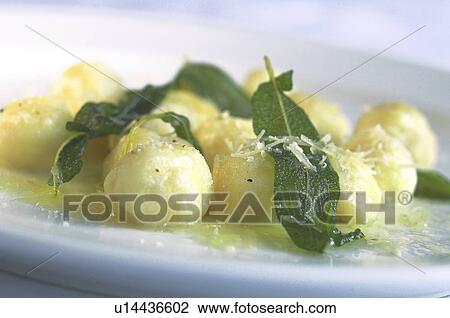 Stock Image - Gnocchi with Sage. Fotosearch