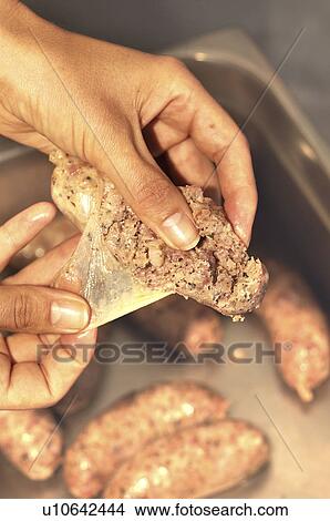 Picture - Making Sausages. Fotosearch