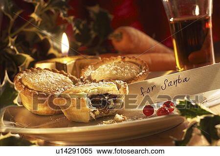 Stock Photography - Mince Pie and carrot for Santa and Rudolph. Fotosearch