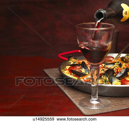 Red Wine and Paella View Large Photo Image Stock Photo - Red Wine and Paella. Fotosearch