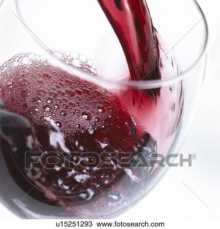 Stock Image - Red Wine Pour. Fotosearch