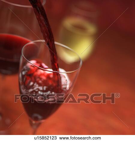 Stock Image - Red Wine Pour. Fotosearch