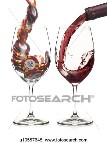 Stock Photography - Red Wine Pour with Casino Chips. Fotosearch