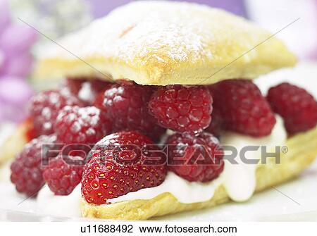 Stock Image - Strawberry and Raspberry dessert. Fotosearch