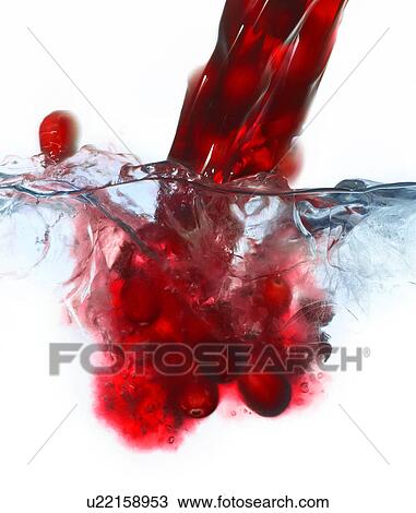 Vodka and Cranberry Cocktail splash View Large Photo Image Stock Image - Vodka and Cranberry Cocktail splash. Fotosearch