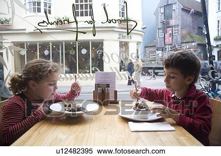 Children Eating in Cafe View Large Photo Image Stock Photography - Children Eating in Cafe. Fotosearch