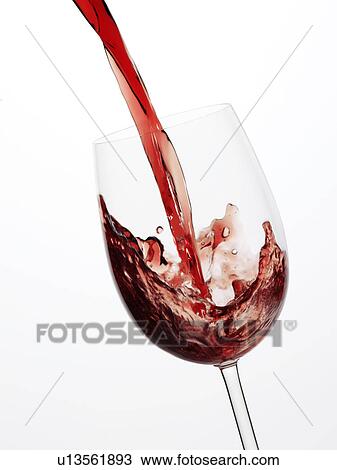 Stock Image - Red Wine Pour. Fotosearch