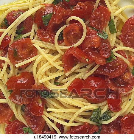 Spaghetti with Tomato and Basil View Large Photo Image Stock Photo - Spaghetti with Tomato and Basil. Fotosearch