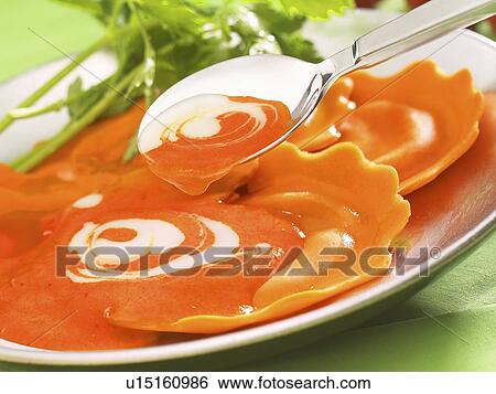 Stock Photograph - Tomato and Pepper Ravioli. Fotosearch