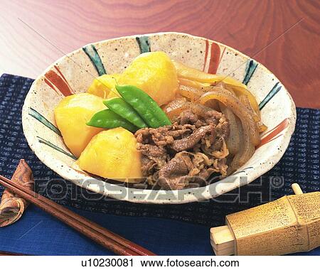 Stock Image - Meat and Potatoes, High Angle View. Fotosearch
