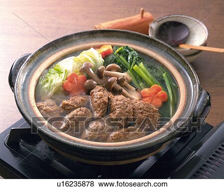 Stock Photo - One Pot Dish Cooked at the Table, High Angle View. Fotosearch