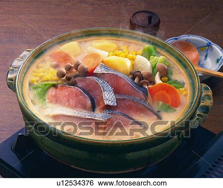 Stock Photograph - One Pot Dish Cooked at the Table, High Angle View. Fotosearch